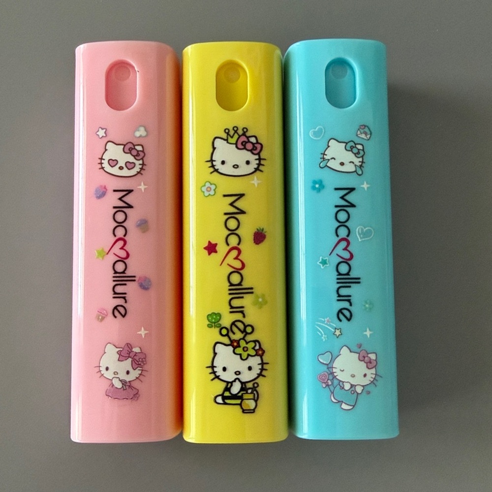 Hello Kitty‎ 3 Piece Mini Refillable Spray Bottle Pink Blue Yellow Travel Set